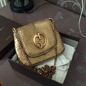 GUCCI Python clutch bag. 
Never worn